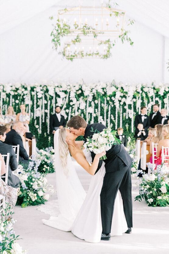 Mckenna and Tres share Kiss at end of ceremony aisle