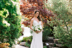 Bride Standing in Serenity Gardens