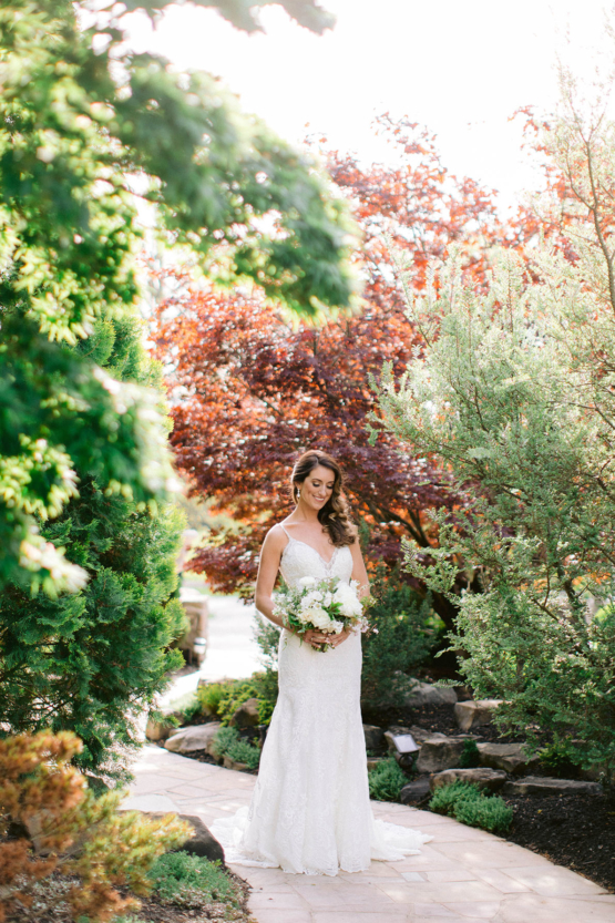 Bride Standing in Serenity Gardens