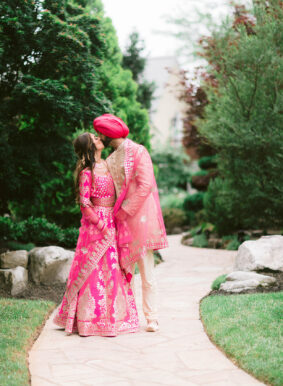 Amber and Sukhbir Kissing in Serenity Gardens