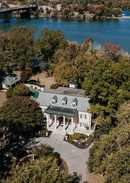 aerial shot of the mansion and lake at Cherokee Dock