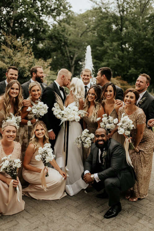 Brittany and Drew Celebrating with Wedding Party