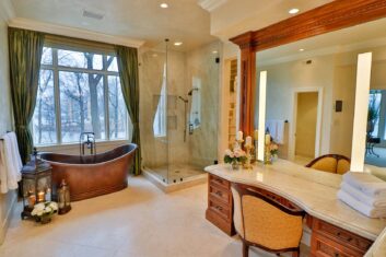 CDM Mansion_Reba-Suite_Bathroom_2 Bathroom of primary suite with copper tub and glass shower