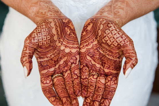 multicultural bride with hand henna tattoos