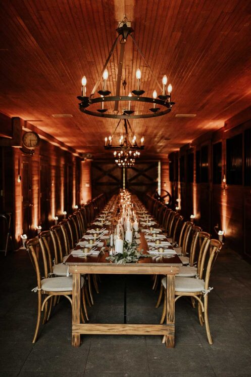 Moody wedding reception Dinner Table Setup in the Carriage House Stables