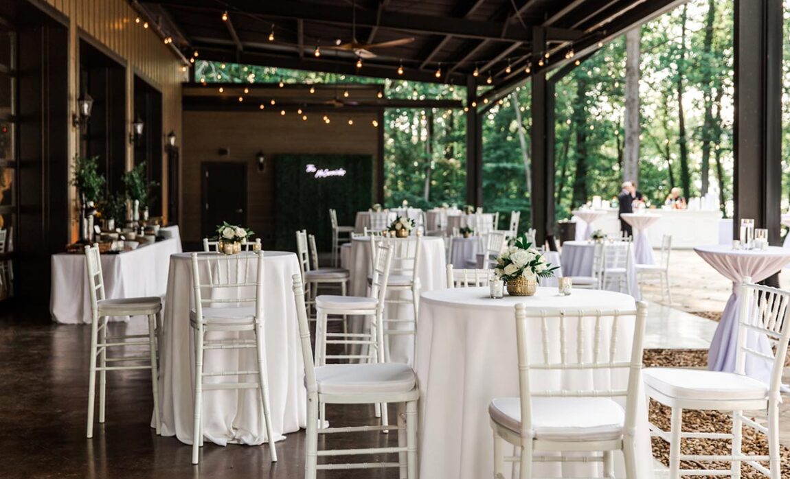 All white cocktail table setup on Lakeview Event Center patio