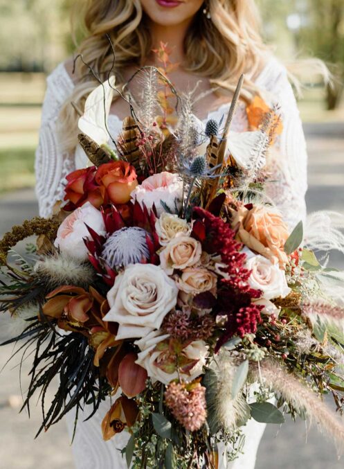 Colorful Boho Wedding Bouquet full of earthy pastels and rust-colored florals