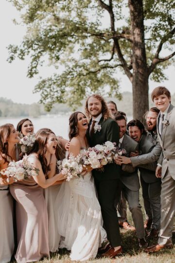 Fun bridal party photo taken on the lakeview lawn