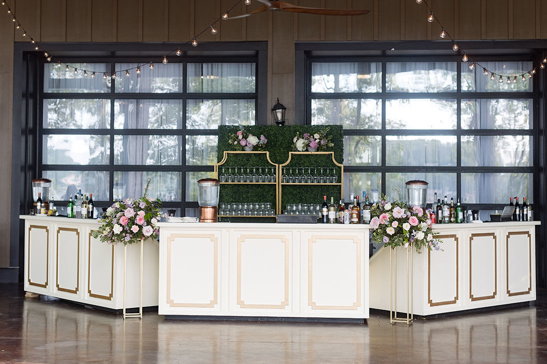 White and gold bar with pastel colored florals