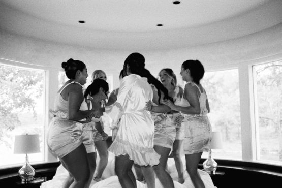 Bridesmaids Celebrate Getting Ready for Wedding Day | Candid Style Wedding Photography at The Estate at Cherokee Dock