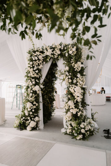 greenery arch way with white florals