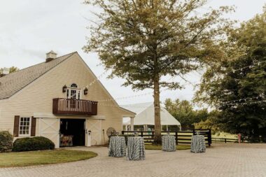 Cocktail table setup on Cobblestone Court outside Sunset Terrace