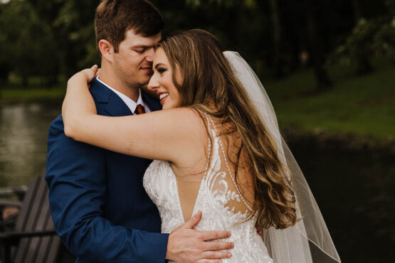 Bride and groom pose for close-up portrait