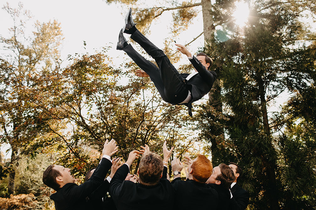 Ben Being Thrown in the Air by Groomsmen