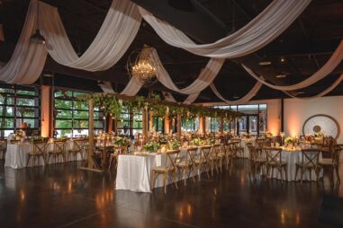 Garden-inspired wedding reception setup inside Lakeview Event Center