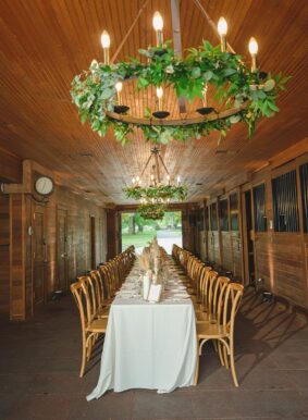 Rehearsal dinner setup inside Carriage House Stables