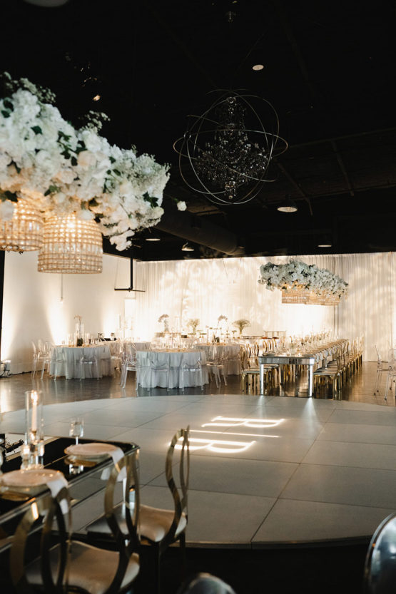 Luxury All White Wedding Reception with Custom Dance Floor and Lighting